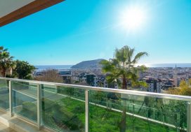 Садовый дуплекс 3+1 с видом на море в Хасбахче, Аланья